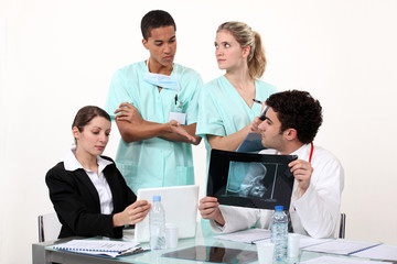 Fototapeta premium Hospital staff hard at work