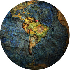 surinam flag on globe map