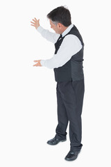 Waiter presenting something