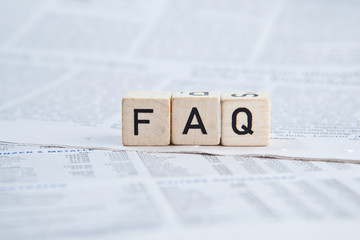 Würfel auf Zeitung - FAQ