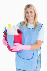 Cleaner woman holding a bucket