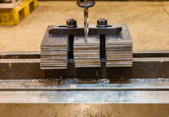 Steel plate pack for drilling