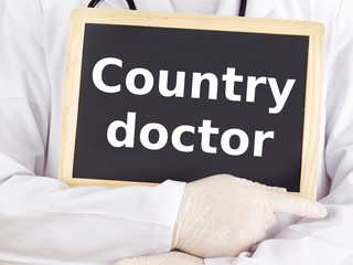 Doctor shows information on blackboard: country doctor