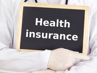 Doctor shows information on blackboard: health insurance