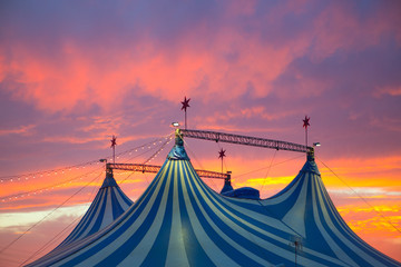 Circus tent in a dramatic sunset sky colorful