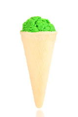 Scoop of the kiwi ice cream in the waffle cone isolated on