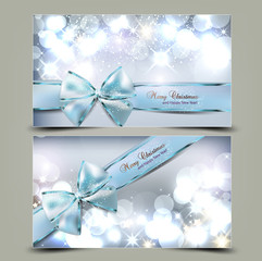Elegant Christmas greeting cards with blue bows and place for te