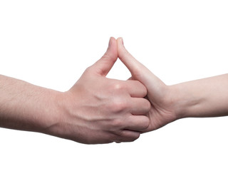 Man and woman forms her hand like a house - isolated