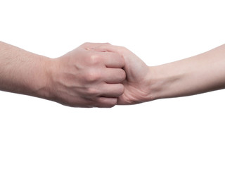 Man and woman forms their hand into a fist - isolated