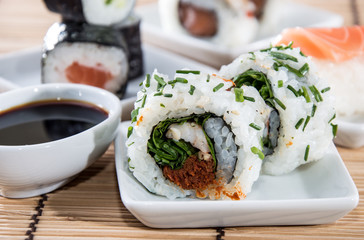 Sushi rolls with sticks and Soy Sauce