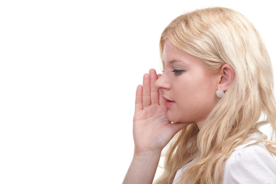 woman eavesdropping with hand behind her ear