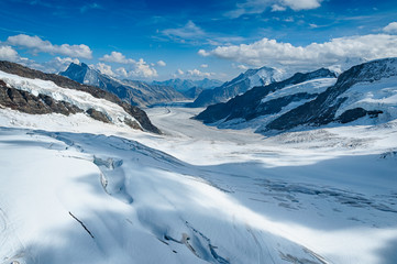 Aletsch. Swiss Alp Glacier with high mountain. View from the top
