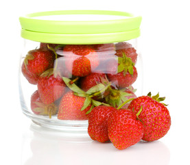 Sweet ripe strawberries in jar isolated on white