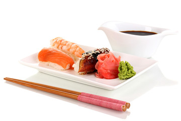 delicious sushi served on plate isolated on white