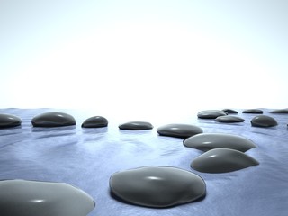 Fototapeta na wymiar Zen stones in water, blue sky