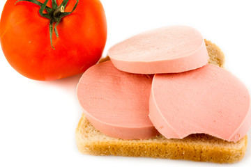 Bread, sausage and tomato