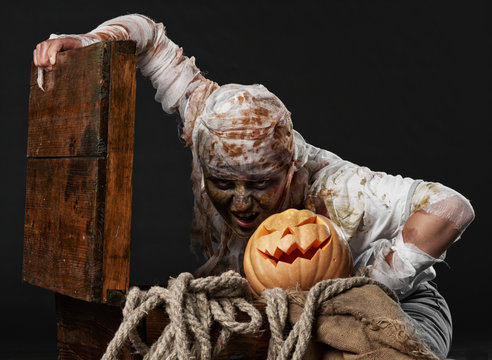 mummy in the studio with pumpkin and rope