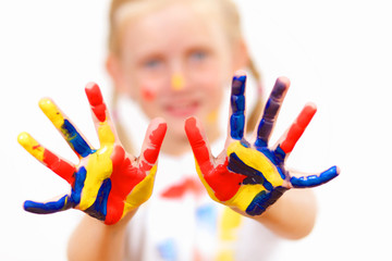 happy child with paint on the hands