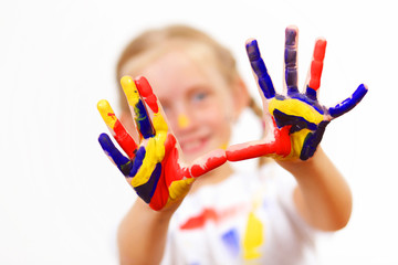 happy child with paint on the hands