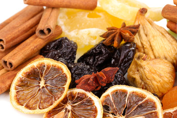 Dried fruits with cinnamon and star anise close-up