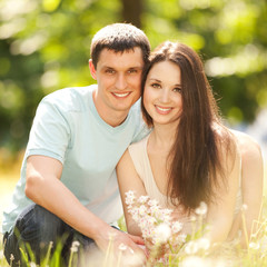 Young happy couple in the park