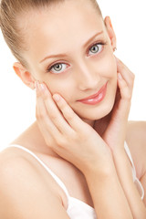 Portrait of young beautiful woman on the white background