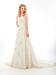 Fototapeta na wymiar Beautiful pretty bride in luxurious wedding modern dress