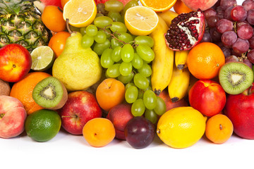 Huge group of fresh fruits isolated on a white