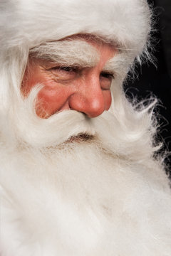 Santa Claus portrait smiling at someone's house at night