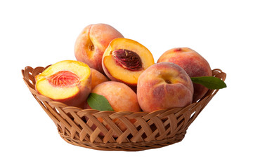 peaches in basket isolated white background