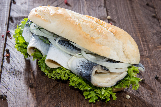 Fish Sandwich on wooden background