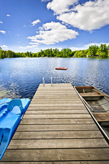 Dock on lake in summer cottage country