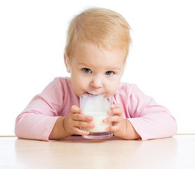 little child drinking yogurt or kefir over white © Oksana Kuzmina