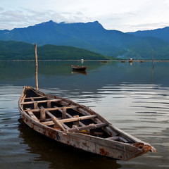 Landscape with boat, mountains and clouds Lang Co bay, Vietnam