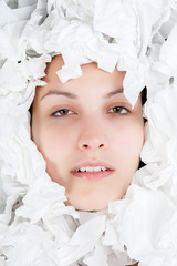 Ill Woman Face with Scrunched Paper Tissues