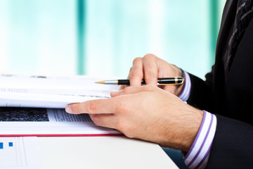 Businessman reading a book