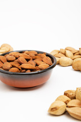 Almonds in a bowl, snacks of nuts
