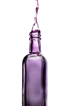Purple splash from bottle