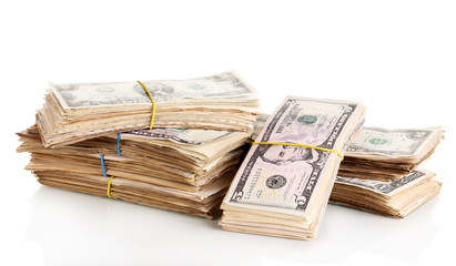 Stacks of dollars isolated on white