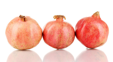 Ripe pomegranates isolated on white