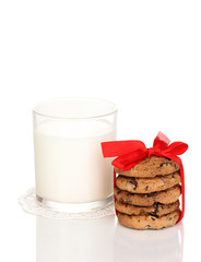 Glass of milk and cookies isolated on white