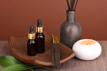 aromatherapy setting on brown background .