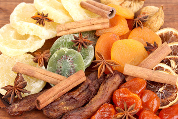 Dried fruits with cinnamon and anise stars close-up