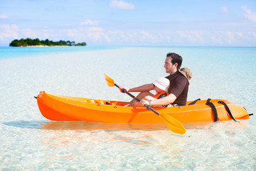 Father and daughter kayaking