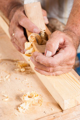 Male hands with plane