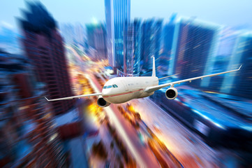 Airplane over the city
