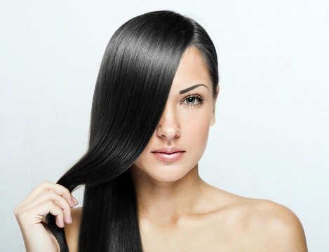 black hair , beautiful brunette woman with long natural hair 