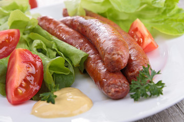 grilled sausage and salad