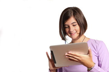 Isolated portrait of a teenage girl with tablet .