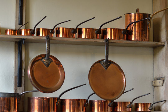 rows of copper pots